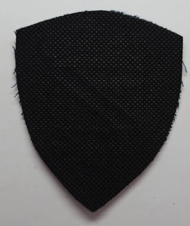 Reverse of embroidered patch showing clean sew-on fabric backing